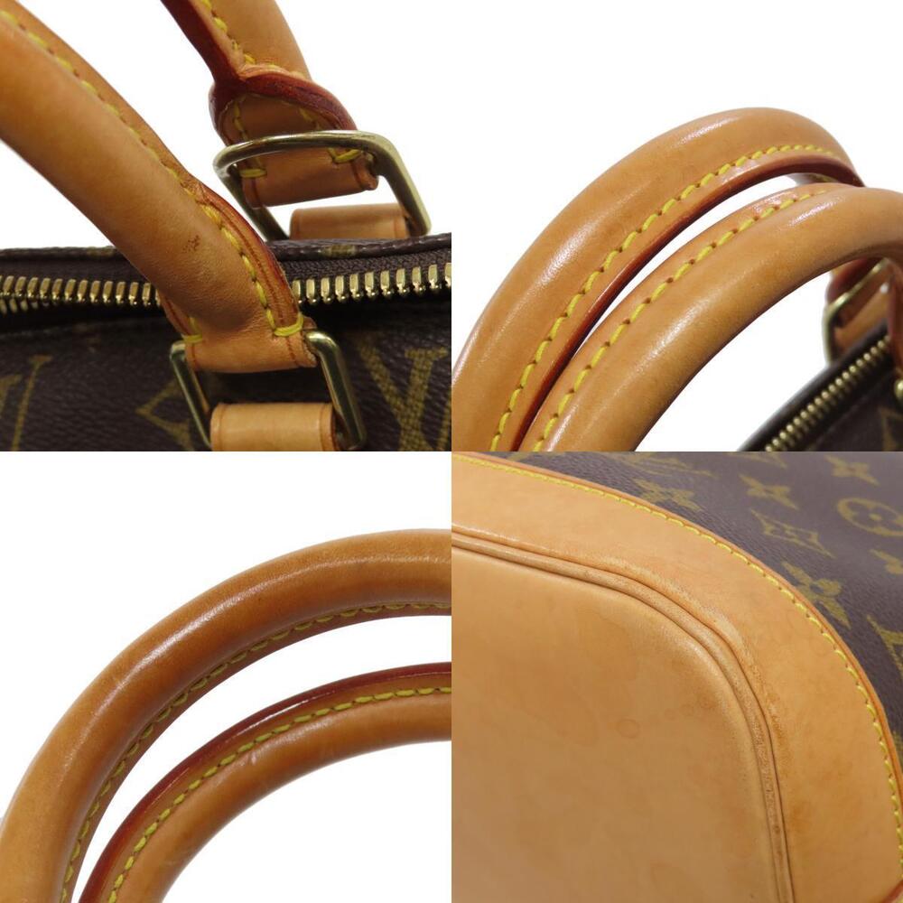 Louis Vuitton Alma Handbag Monogram Canvas - Picture 9 of 10